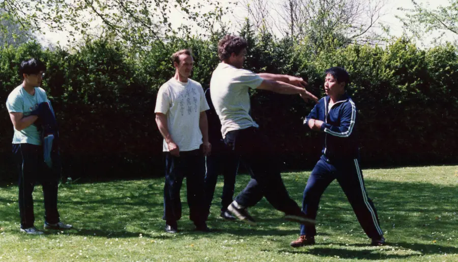 One of Master Lam's students goes flying during a summer workshop at Hawkwood College, Stroud